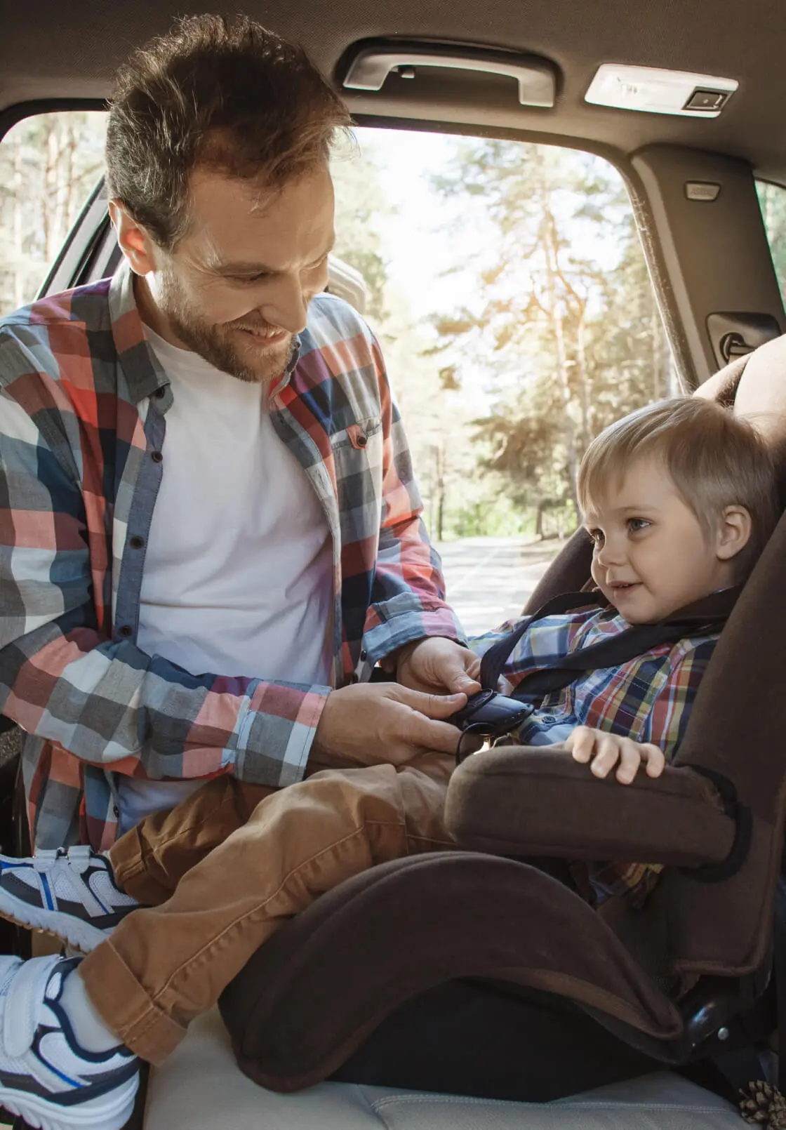 Dad Strapping Car Seat